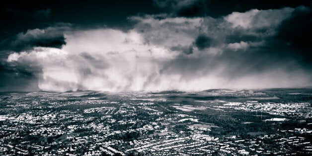 Airborne image of a very heavy snowstorm drifting gently through the Hampshire countryside in December.