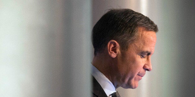 Mark Carney, governor of the Bank of England, pauses as he delivers a speech in Edinburgh, U.K., on Wednesday, Jan. 29, 2014. Scotland will probably need to mirror the euro-region's integration plans and surrender some sovereignty if the nation votes to separate from the rest of the U.K., Carney said. Photographer: Simon Dawson/Bloomberg via Getty Images