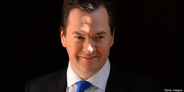 Britain's Chancellor of the Exchequer George Osborne awaits the arrival of Indian Finance Minister Shri Chidambaram for a bilateral meeting in central London on May 16, 2013. AFP PHOTO / BEN STANSALL (Photo credit should read BEN STANSALL/AFP/Getty Images)