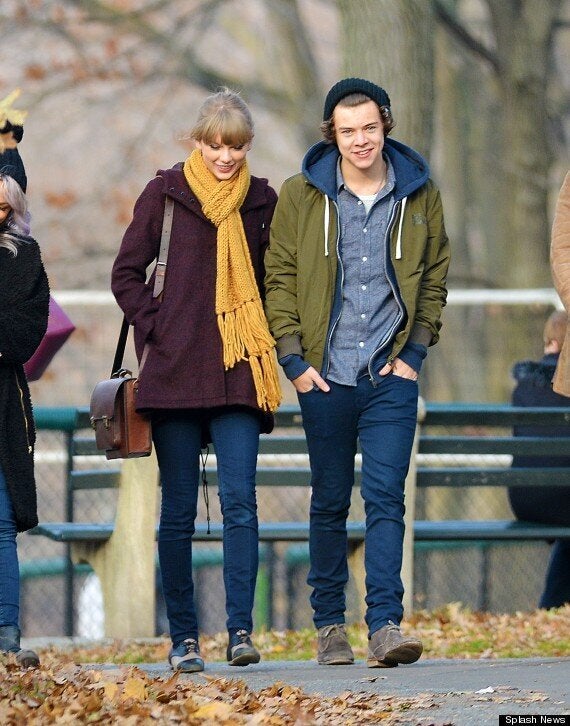 Harry Styles looks pleased with himself as he leaves Taylor