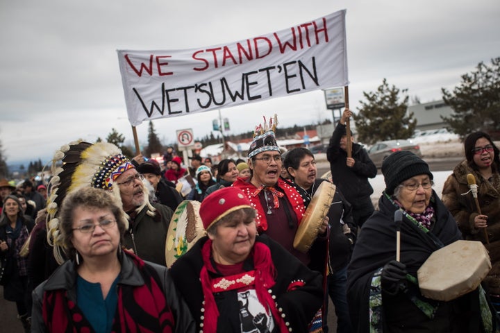 Hereditary Chief Ronnie West from the Lake Babine First Nation, sings and beats a drum during a solidarity march in Smithers, B.C., on Jan. 16, 2019. 