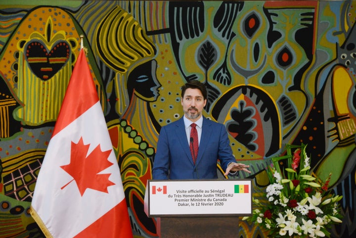 Prime Minister Justin Trudeau takes part in a joint press conference with President of Senegal Macky Sall at the Presidential Palace in Dakar on Feb. 12, 2020. 