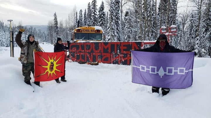 Anne Spice, left, Eve Saint, centre and Shilo Hill in Wet'suwet'en territory in January 2020. They were arrested together on Friday.