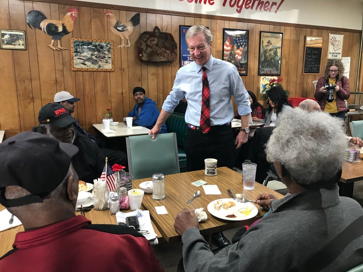 Presidential Candidate Tom Steyer greets residents at Gene's Restaurant in Chester, South Carolina, over breakfast.