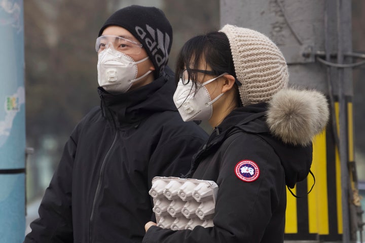 Wuhan, a city of 11 million people, remains under virtual lockdown, and other major Chinese cities are facing severe travel restrictions.