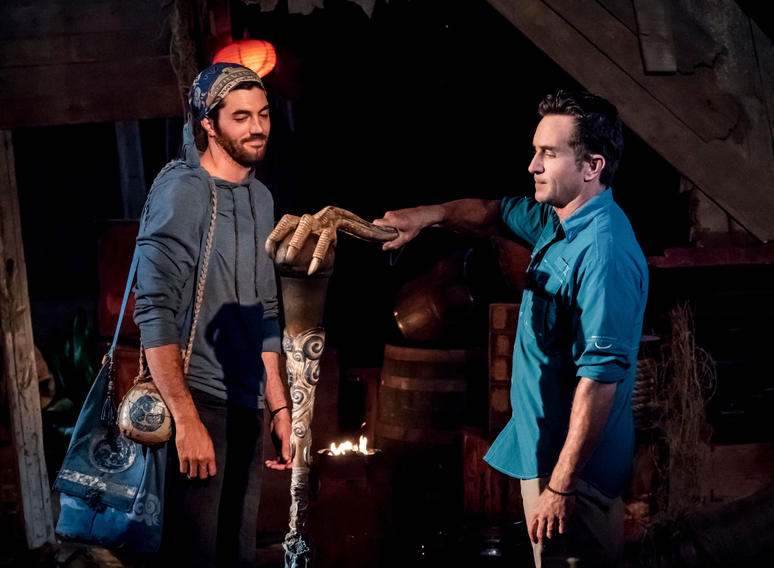 Jeff Probst extinguishes Chris Underwood's torch at Tribal Council on the third episode of "Survivor: Edge of Extinction."