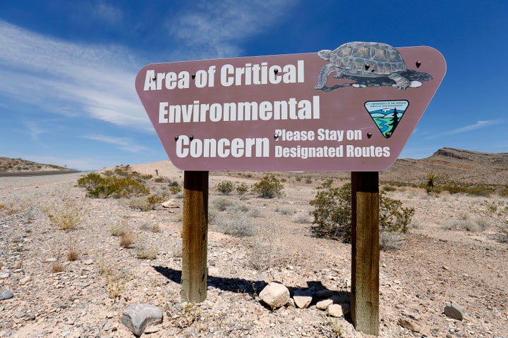 A Bureau of Land Management sign informs travelers along Highway 168, near Maopa, Nevada, to the habitat of the Mojave desert tortoise.