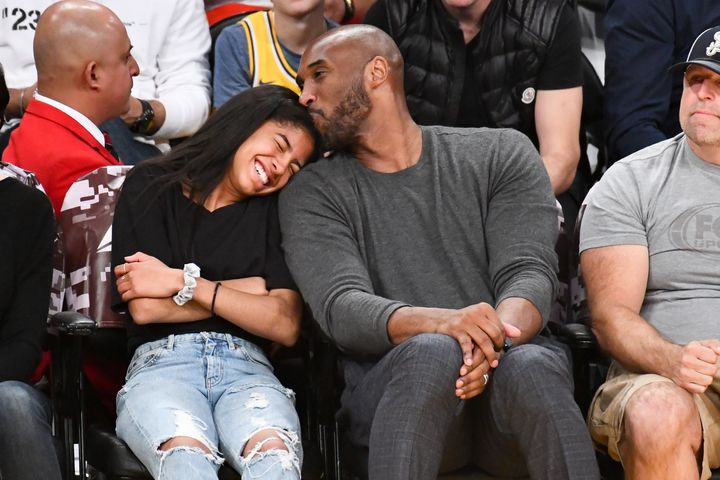 Kobe Bryant and his daughter Gianna Bryant attend a basketball game between the Los Angeles Lakers and the Atlanta Hawks in Los Angeles on Nov. 17, 2019.