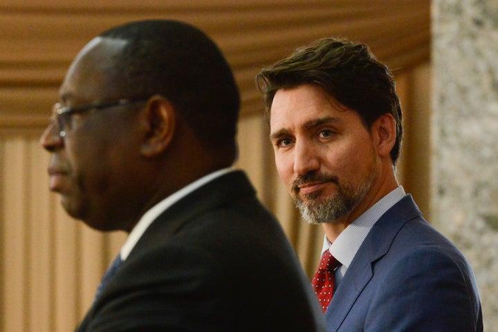 Prime Minister Justin Trudeau takes part in a joint press conference with Senegal President Macky Sall at the Presidential Palace in Dakar, Senegal on Feb. 12, 2020.