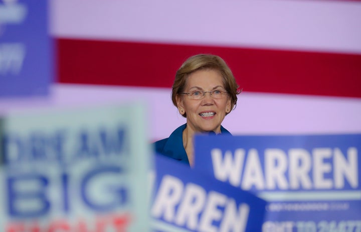 Sen. Elizabeth Warren (D-Mass.) would introduce a public option and then, after two years, ask Congress to take up Medicare for All.