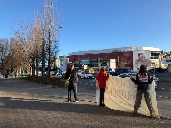 Allies of the Wet'suwet'en hereditary chiefs picket outside government buildings in Victoria, B.C. on Feb. 14, 2020.