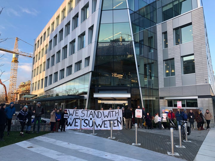 Wet'suwet'en hereditary chief supporters picket outside the B.C. Ministry of Environment building in Victoria on Feb. 14, 2020. 