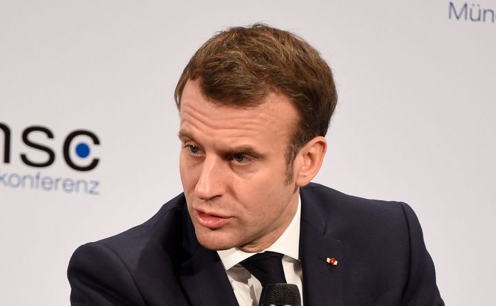 French President Emmanuel Macron gestures on the second day of the Munich Security Conference in Munich, Germany, Saturday, Feb. 15, 2020. (AP Photo/Jens Meyer)