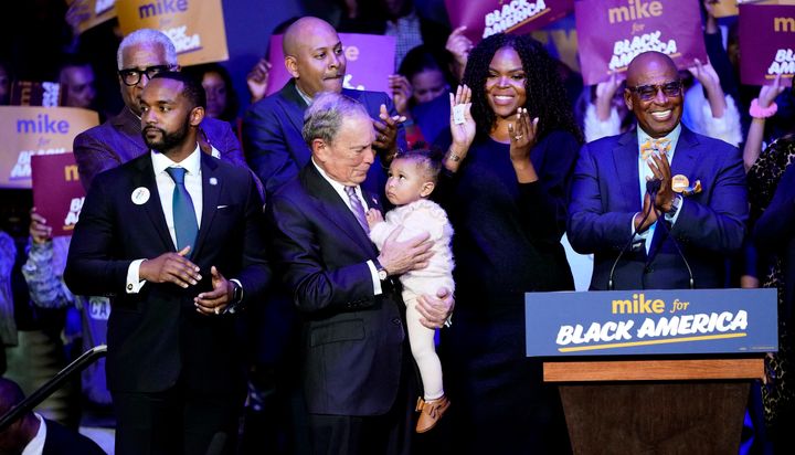 Michael Bloomberg is joined on stage by supporters for his campaign's launch of "Mike for Black America" on Feb. 13, 2020, in Texas.
