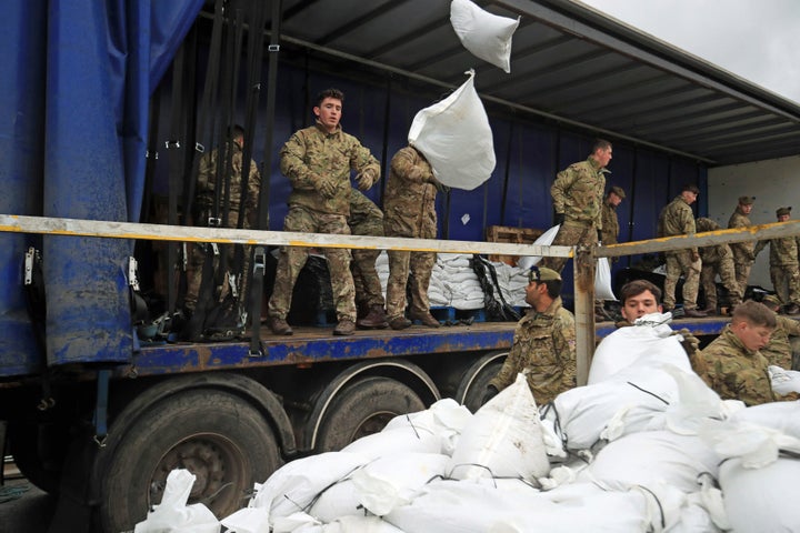 Soldiers from The Highlanders, 4th Battalion, the Royal Regiment of Scotland assisting with flood defences in Mytholmroyd, West Yorkshire on Saturday