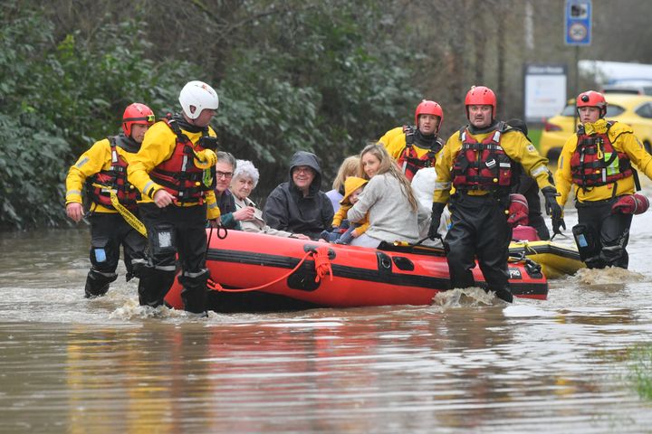 Members of the public are rescued after flooding in Nantgarw, Wales as Storm Dennis hit the UK.