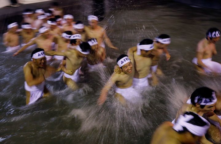 The men must walk in a purification pool before entering the temple building.