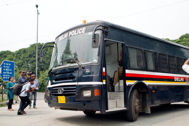 A police van carrying the men convicted in the 2012 gang-rape case arrives at the Saket Court Complex...