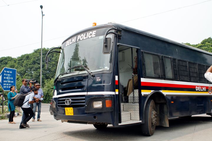 A police van carrying the men convicted in the 2012 gang-rape case arrives at the Saket Court Complex on September 13, 2013 in New Delhi.