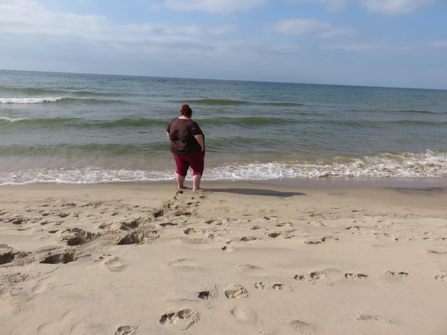 Juliet James on a Lake Michigan beach in October