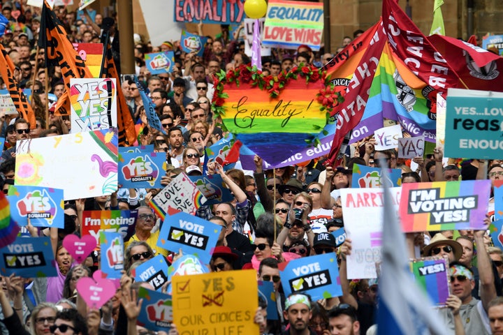 This picture taken on September 10, 2017 shows demonstrators taking part in a same-sex marriage rally in Sydney. 