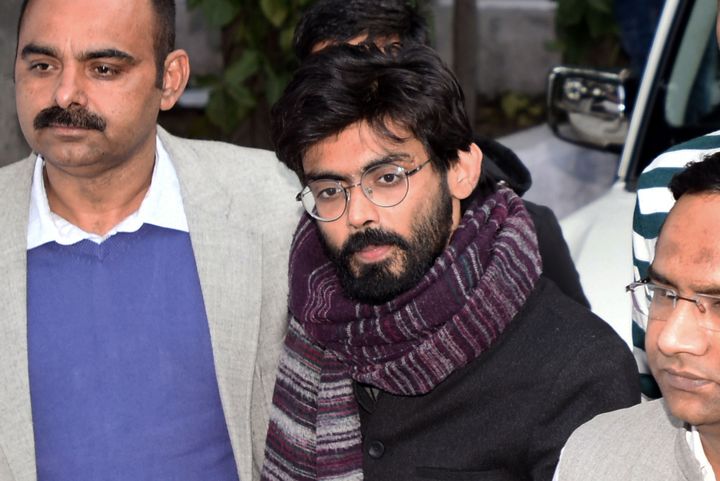 JNU student Sharjeel Imam is taken by Crime branch officials to Saket court after his arrest from Bihar, at Delhi Police Crime Branch office, Chanakyapuri, on January 29, 2020 in New Delhi.
