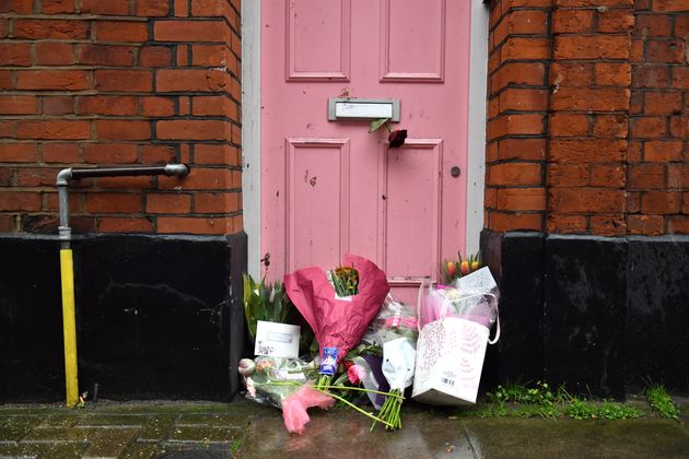 Floral tributes placed outside Caroline Flack's home in North London. 