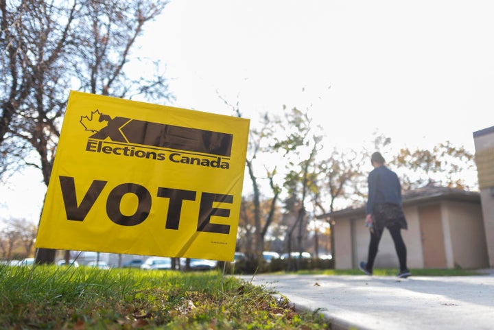 A woman leaves a voting station at Regina Senior Citizens' Centre on election day in Regina on Oct. 21, 2019. 