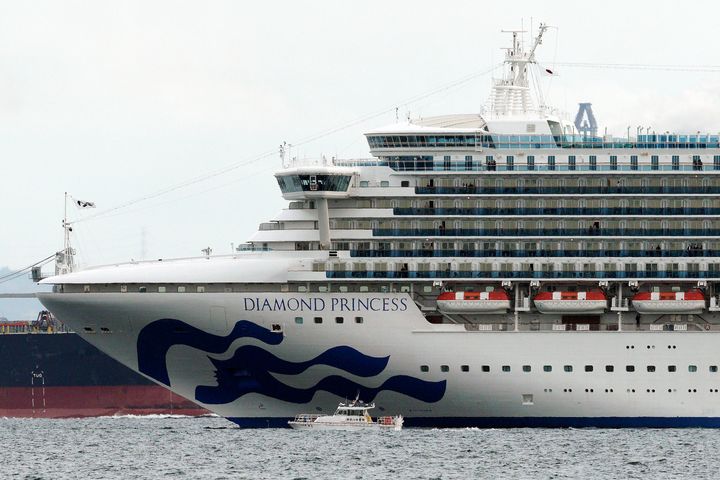 Japanese health officials are conducting extensive medical checks on all 3,700 passengers and crew of the cruise ship that returned to Japan after one passenger tested positive for the new coronavirus.