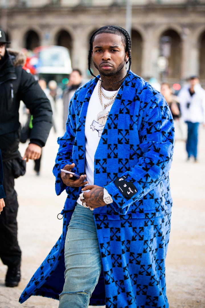 PARIS, FRANCE - JANUARY 15: Rapper Pop Smoke, wearing a blue Off-White coat, is seen outside the Off-White show during the Paris Fashion Week - Menswear F/W 2020-2021 on January 15, 2020 in Paris, France. (Photo by Claudio Lavenia/Getty Images)