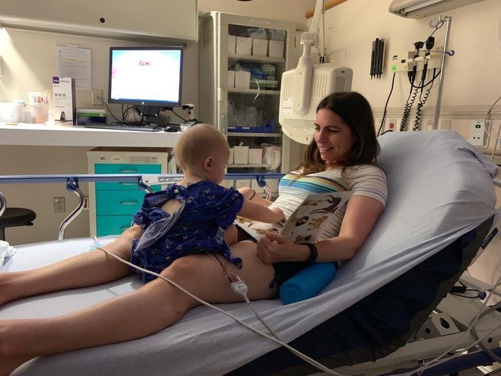 Educating and entertaining my child with books during one of his many ER visits in summer 2019.