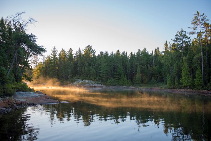 Sunrise on a lake in the Temagami area in northeastern Ontario. 