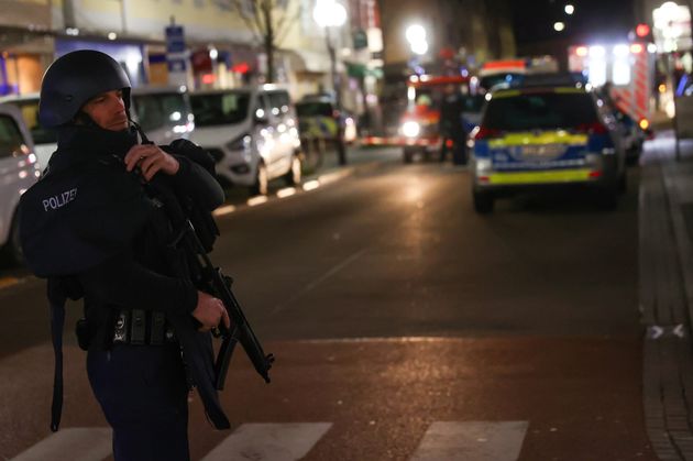 A police officer secures the area after a shooting in Hanau near Frankfurt.