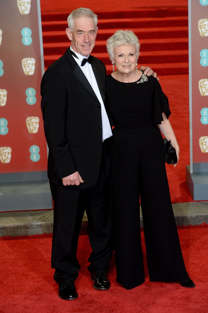 Dame Julie with her husband, Grant Roffey