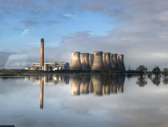 <strong>Eggborough power station in North Yorkshire is reflected in floodwater from the River Aire.</strong>