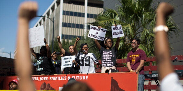 LOS ANGELES, CALIFORNIA - MAY 1: Black Lives Matter demonstrators express themselves at one of several May Day marches on May 1, 2016 in Los Angeles, California. Immigrants, union members, workers and supporters are participating in the annual marches in downtown Los Angeles to call for greater rights for immigrants and improved conditions for workers. (Photo by David McNew/Getty Images)