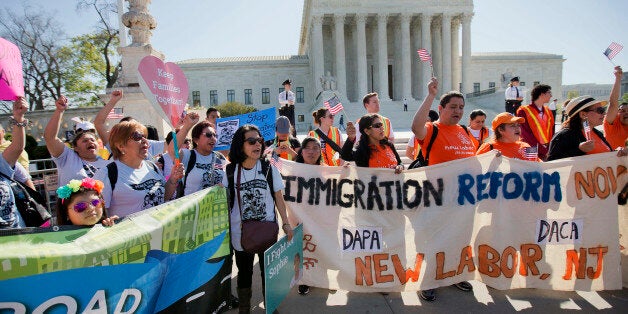 Supporters of fair immigration reform gather in front of the Supreme Court in Washington, Monday, April 18, 2016. The Supreme Court is taking up an important dispute over immigration that could affect millions of people who are living in the country illegally. The Obama administration is asking the justices in arguments today to allow it to put in place two programs that could shield roughly 4 million people from deportation and make them eligible to work in the United States. (AP Photo/Pablo Martinez Monsivais)