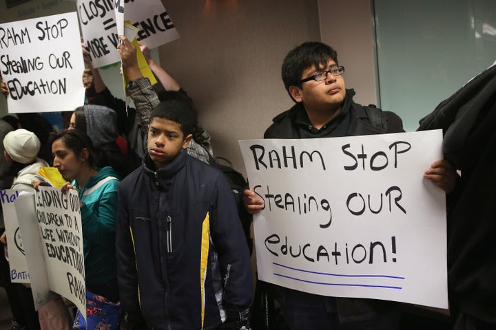 CHICAGO, IL - MARCH 25: Students protest outside the Chicago Public Schools headquarters against the city's plan to close more than 50 elementary schools on March 25, 2013 in Chicago, Illinois. Last week the city announced the plan claiming it was necessary to rein in a looming $1 billion budget deficit. The closings would shift about 30,000 students to new schools and leave more than 1,000 teachers with uncertain futures. (Photo by Scott Olson/Getty Images)