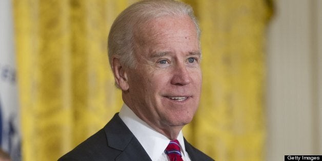 US Vice President Joe Biden speaks during an event highlighting Joining Forces hiring initiative for military veterans and spouses in civilian jobs in the East Room of the White House in Washington, DC, on April 30, 2013. Since President Obama challenged American businesses to hire US military veterans and spouses in August 2011, they have hired or trained 290,000 military veterans and spouses and now pledge to hire or train an additional 435,000 veterans and military spouses by 2018. AFP PHOTO / Saul LOEB (Photo credit should read SAUL LOEB/AFP/Getty Images)