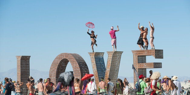 BLACK ROCK CITY, NV - SEPT 2: First-time Burner Sonja Lercer of Whistler, B.C., Canada, dances on the LOVE installation at la