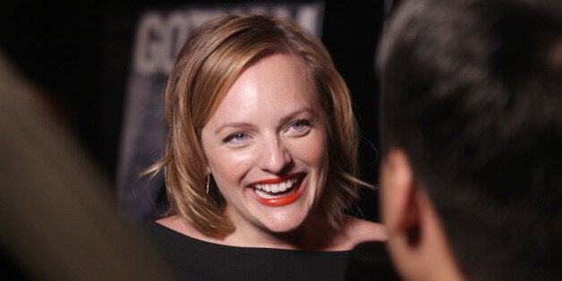 Actress Elisabeth Moss attends Gotham Magazine Fall Fashion Issue celebration at Tender Restaurant at the Sanctuary Hotel on Monday, Sept. 8, 2014, in New York. (Photo by Donald Traill/Invision/AP)