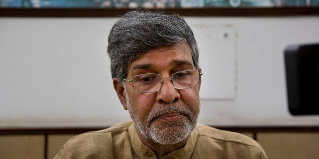 Indian children's rights activist Kailash Satyarthi takes a moment as he addresses the media at his office in New Delhi, India, Friday, Oct. 10, 2014. Malala Yousafzai of Pakistan and Satyarthi of India jointly won the Nobel Peace Prize on Friday, Oct. 10, 2014, for risking their lives to fight for children's rights. (AP Photo/Bernat Armangue)