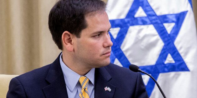 US Republican Senator Marco Rubio speaks with Israeli President on February 20, 2013 at the presidential compound Jerusalem. AFP PHOTO/MARCO LONGARI (Photo credit should read MARCO LONGARI/AFP/Getty Images)