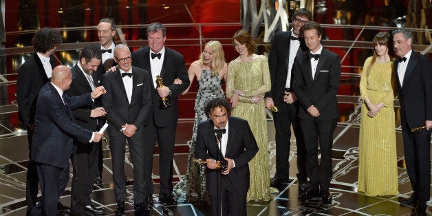 HOLLYWOOD, CA - FEBRUARY 22: Director Alejandro Gonzalez Inarritu (C) with cast and crew accept the Best Picture award for 'Birdman' onstage during the 87th Annual Academy Awards at Dolby Theatre on February 22, 2015 in Hollywood, California. (Photo by Kevin Winter/Getty Images)