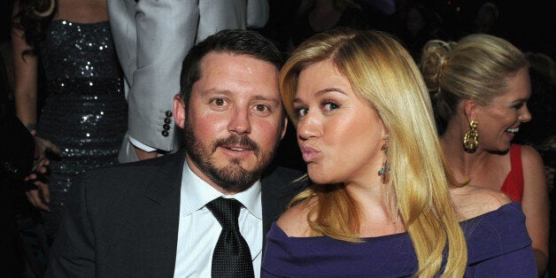 LAS VEGAS, NV - APRIL 07: Singer Kelly Clarkson (R) and Brandon Blackstock in the audience during the 48th Annual Academy of Country Music Awards at the MGM Grand Garden Arena on April 7, 2013 in Las Vegas, Nevada. (Photo by Kevin Winter/ACMA2013/Getty Images for ACM)