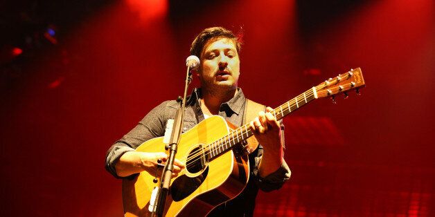 ST PAUL, MN - SEPTEMBER 04: Marcus Mumford of the band Mumford & Sons performs on September 4, 2013 at The Xcel Energy Center in St. Paul, Minnesota. (Photo by Adam Bettcher/Getty Images)