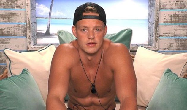 Ollie speaking in the Love Island beach hut