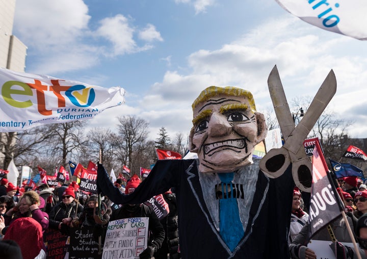 Members of the Ontario Federation of Labour protest outside Ontario Progressive Conservative party 2020 policy convention in Niagara Falls, Ont. on Feb. 22, 2020.