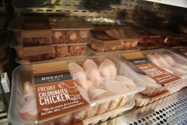 Packs of 'Brexit Selection Freshly Chlorinated Chicken' sit on display at 'Costupper' Brexit Minimart pop-up store, set up by the People's Vote campaign group in 2018. 