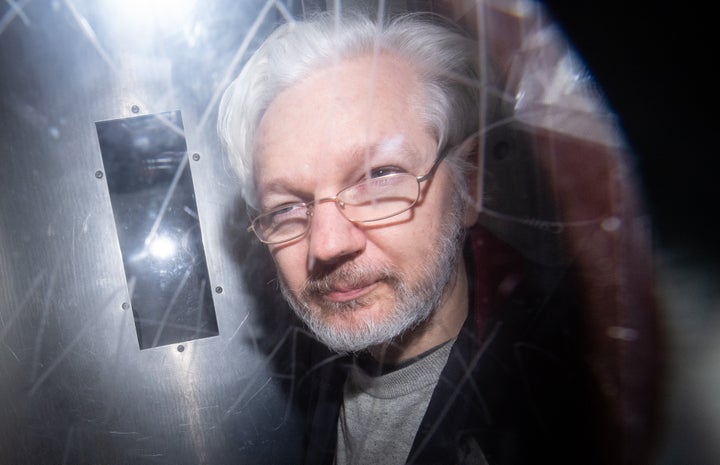 Wikileaks founder Julian Assange leaving Westminster Magistrates Court in London, where he was appearing for an administrative hearing relating to his extradition. 